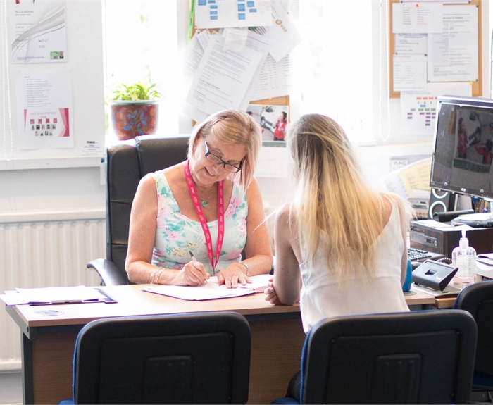 A student receiving support from Aston Student Advice